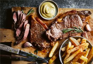 Read more about the article Steak, chips with garlic, and rosemary butter