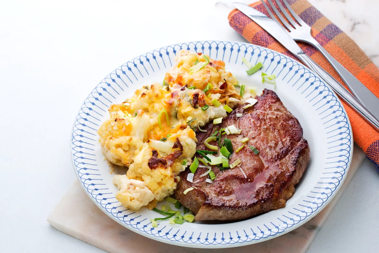 You are currently viewing Pork shoulder chops with cauliflower au gratin